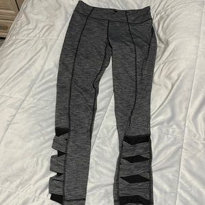 Athleta girl leggings with tie design on calf’s. Size XL